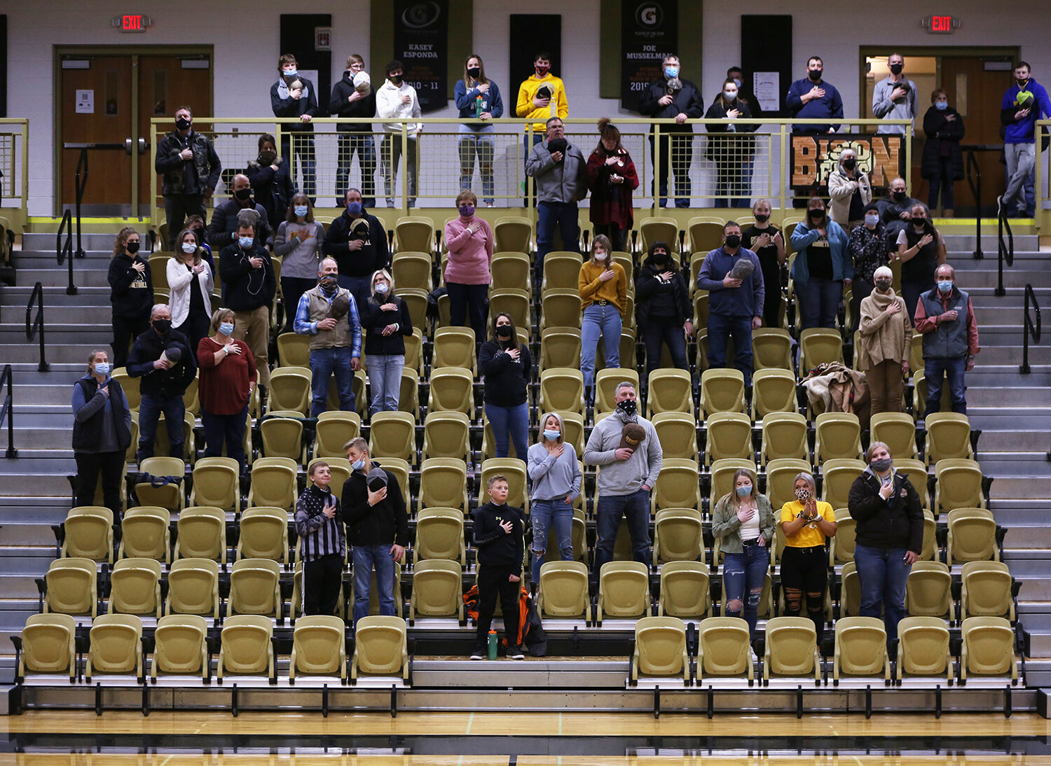 Fans spread out in the stands during the singing of the National Anthem